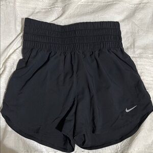 Nike Women's Black Athletic Shorts with Silver Logo